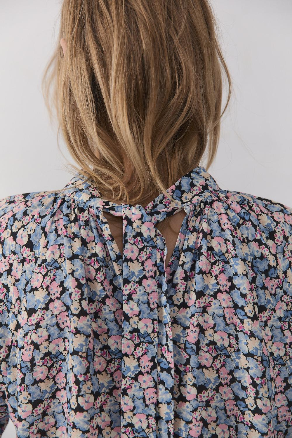 the new society Blusa de mujer de Ginebra Ahorra y exporta