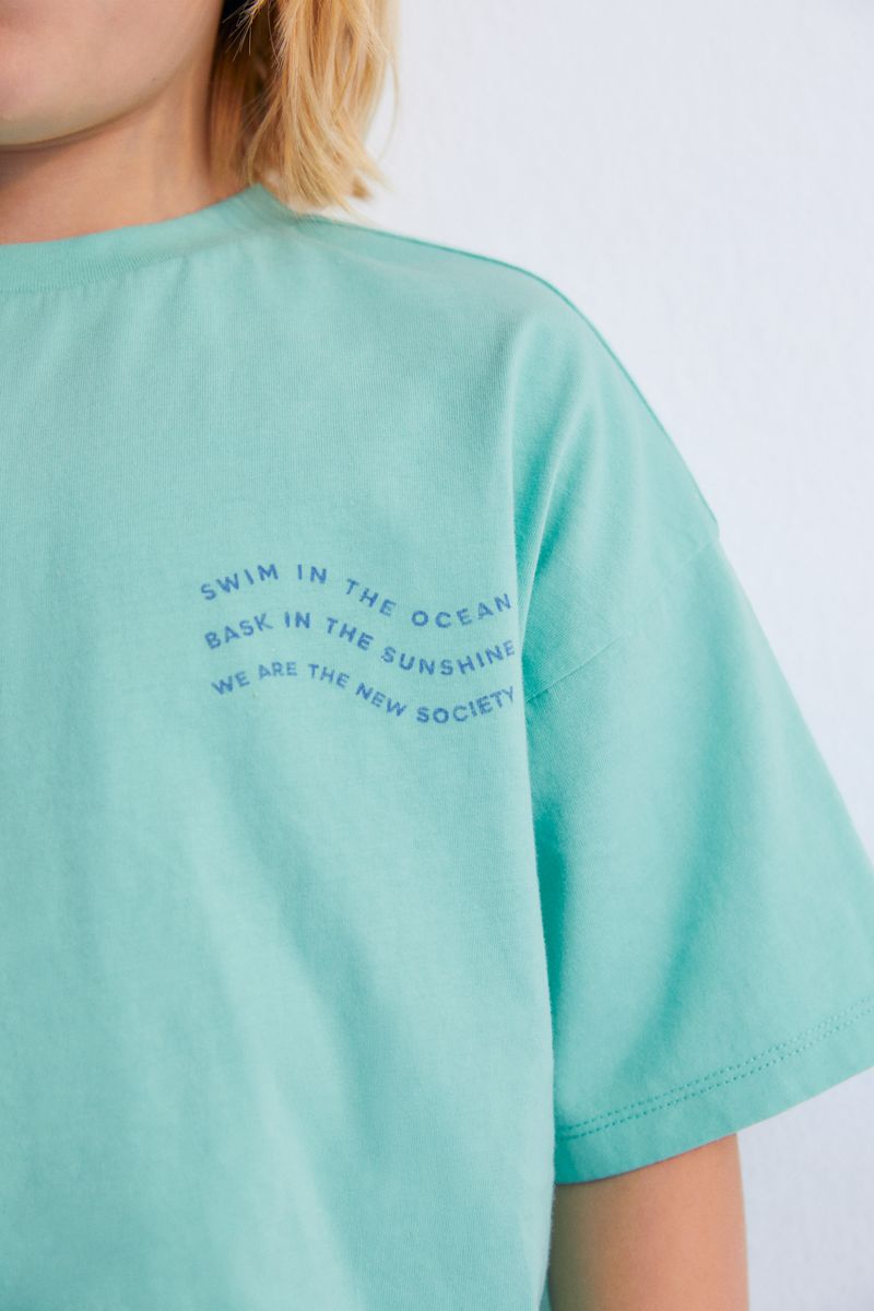 the new society Camiseta de Kymi Últimos 3 días