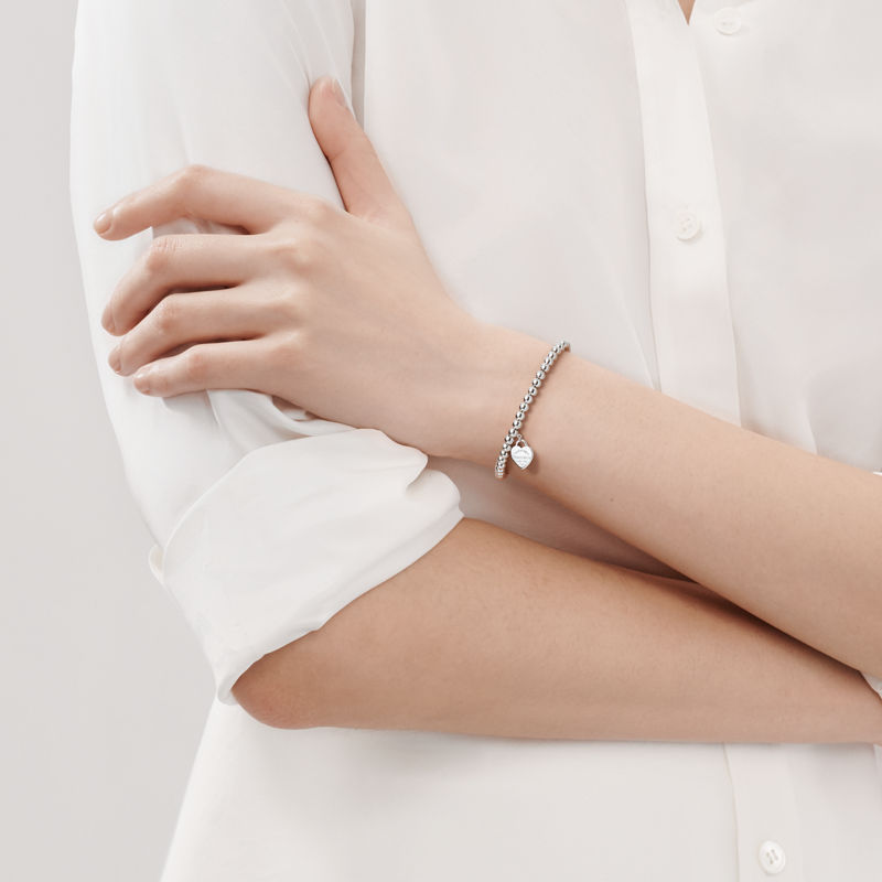 Tiffany & Co. Return to Tiffany™ Pulsera de cuentas con insignia de corazón en plata Descuentos del mes