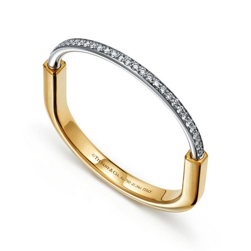 Tiffany & Co. Tiffany Lock Brazalete en oro amarillo y blanco con medio pavé de diamantes COMPRAR AHORA