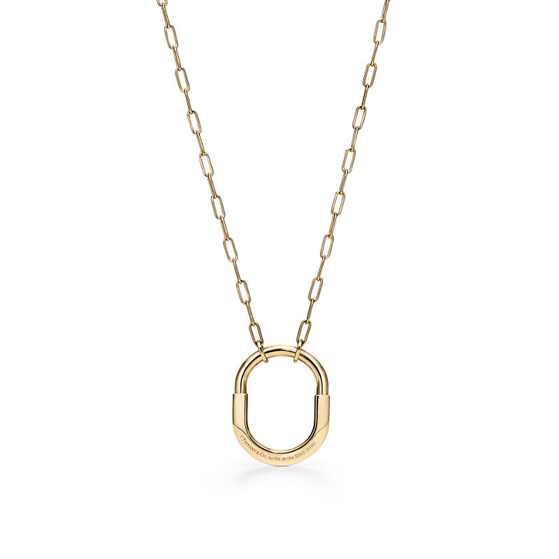 Tiffany & Co. Tiffany Lock Colgante en oro amarillo con diamantes tamaño mediano Promoción trimestral