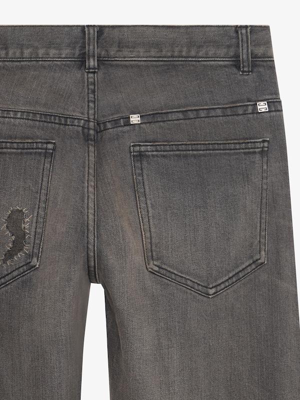 Givenchy Straight fit jeans in vintage destroyed denim Precio de fábrica