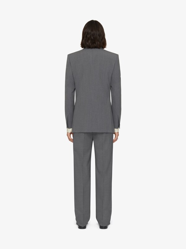 Givenchy Slim fit tailored pants in wool with 2G clip Envío internacional gratuito