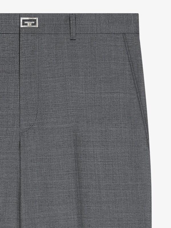 Givenchy Slim fit tailored pants in wool with 2G clip Envío internacional gratuito
