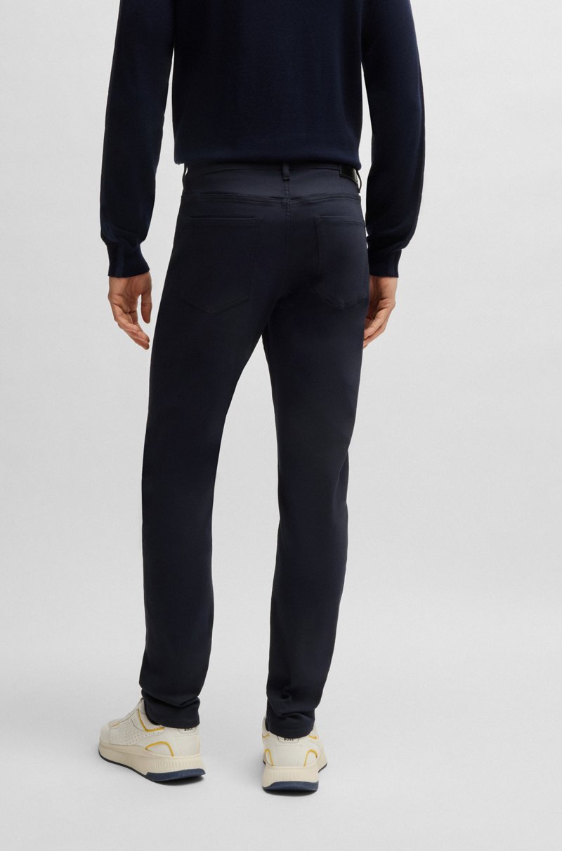Hugo Boss Vaqueros Porsche x BOSS tapered fit de tejido vaquero elástico técnico en tono azul Libre de impuestos