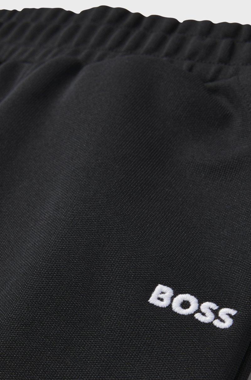 Hugo Boss Pantalones de chándal tapered fit para niños con ribetes de espiga Mejor oferta