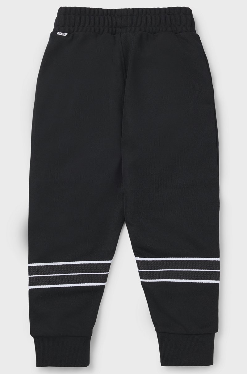 Hugo Boss Pantalones de chándal tapered fit para niños con ribetes de espiga Mejor oferta
