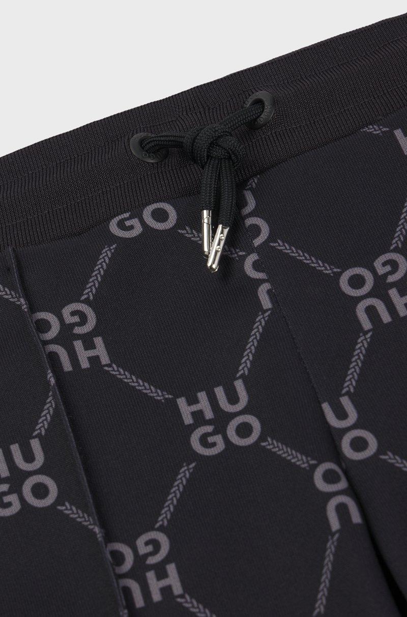 Hugo Boss Pantalones de chándal loose fit para niños con logo apilado estampado Promoción trimestral