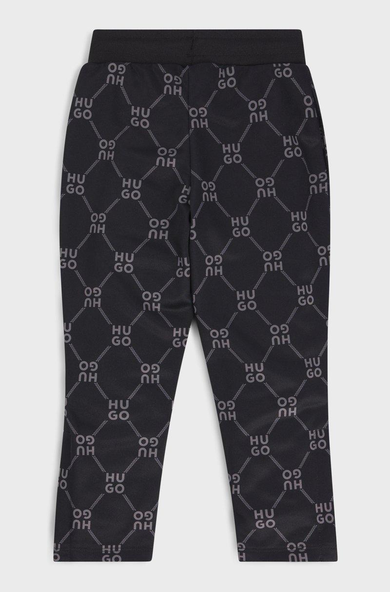 Hugo Boss Pantalones de chándal loose fit para niños con logo apilado estampado Promoción trimestral