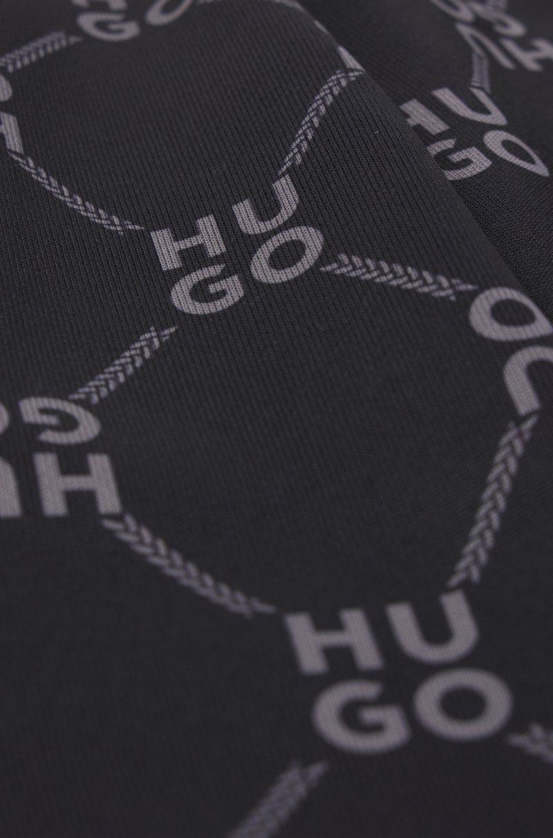 Hugo Boss Pantalones de chándal loose fit para niños con logo apilado estampado Venta caliente
