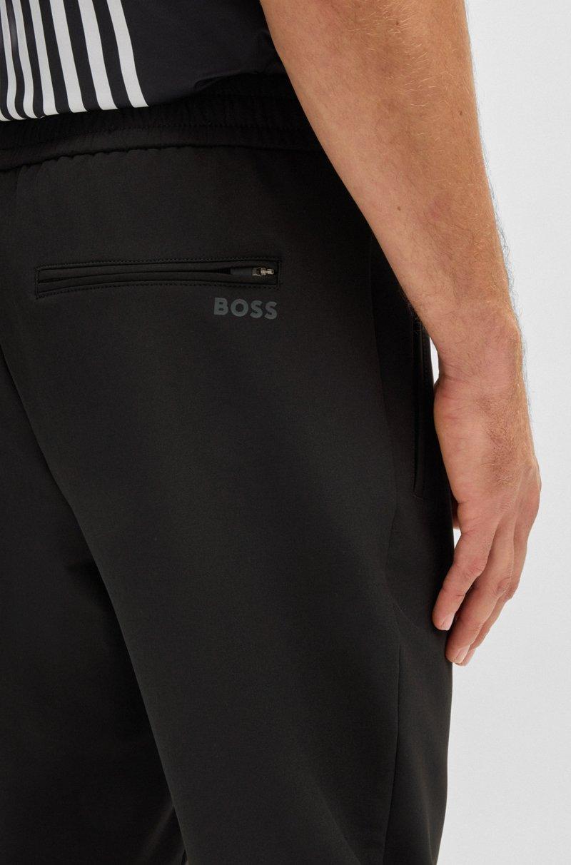 Hugo Boss Pantalones tapered fit de tejido elástico repelente al agua Rebajas de fin de temporada