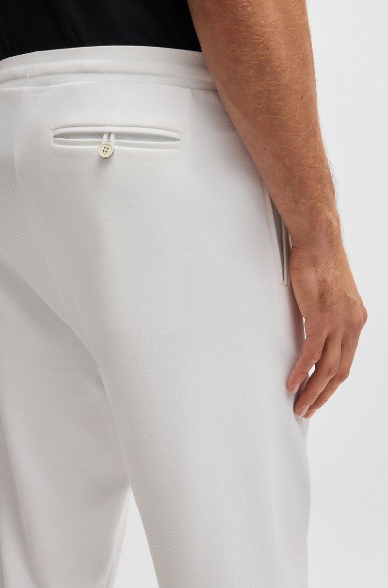 Hugo Boss Pantalones regular fit en tejido de gabardina elástico con detalle de logo Descuento