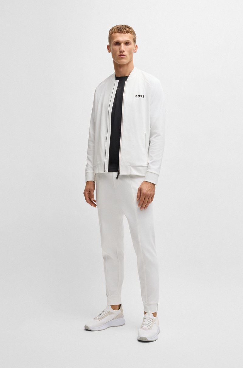 Hugo Boss Pantalones regular fit en tejido de gabardina elástico con detalle de logo Descuento