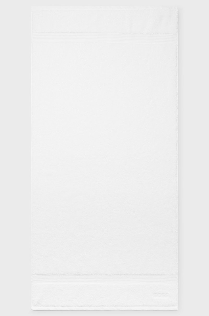 Hugo Boss Toalla de baño blanca de algodón del Egeo con logo tonal Rebajas de fin de temporada
