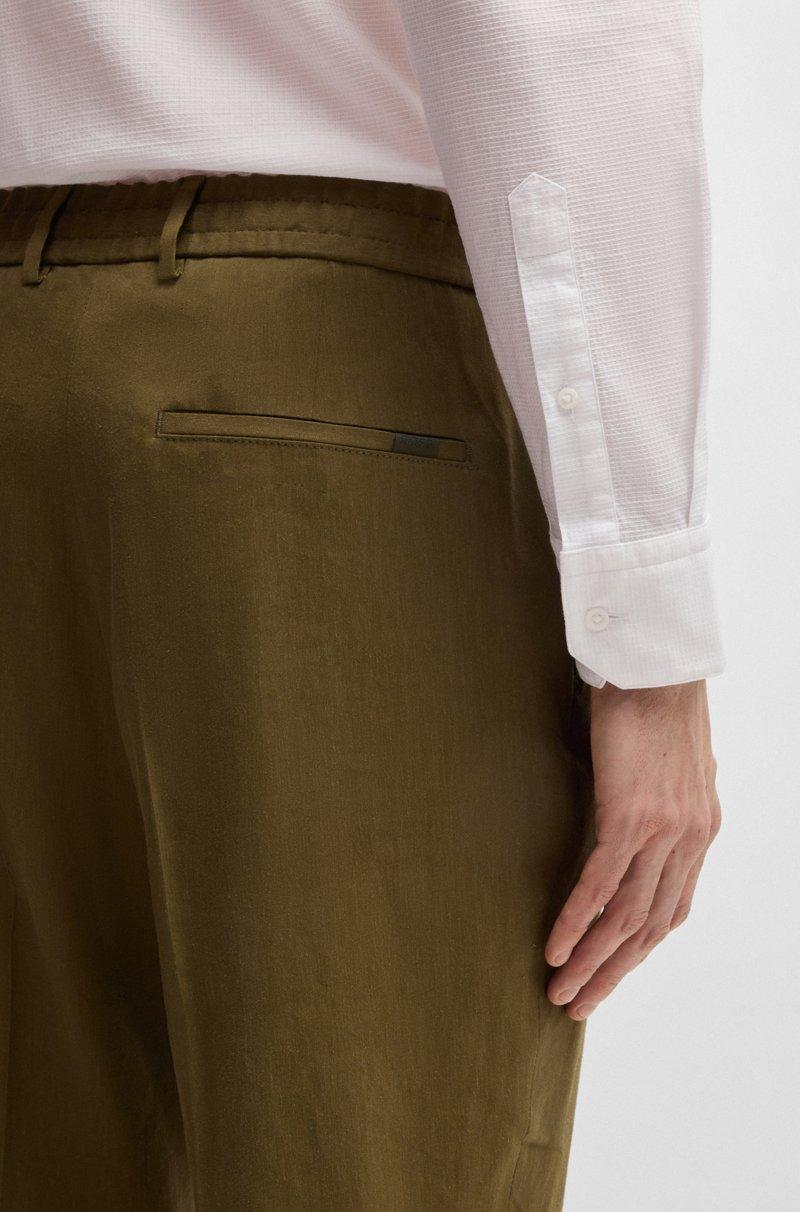 Hugo Boss Pantalones tapered fit en mezcla de lino Ofertas especiales