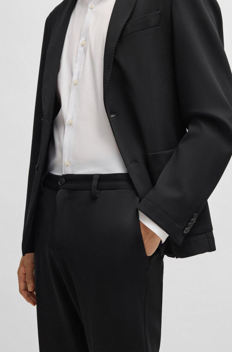 Hugo Boss Pantalones slim fit en tejido elástico lavable Devoluciones gratuitas