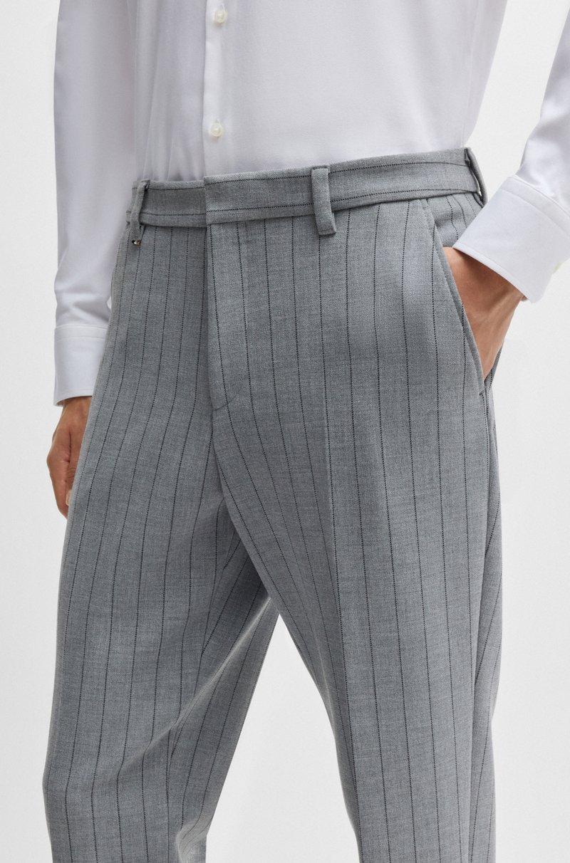 Hugo Boss Pantalones slim fit en tejido elástico con raya diplomática Outlet online