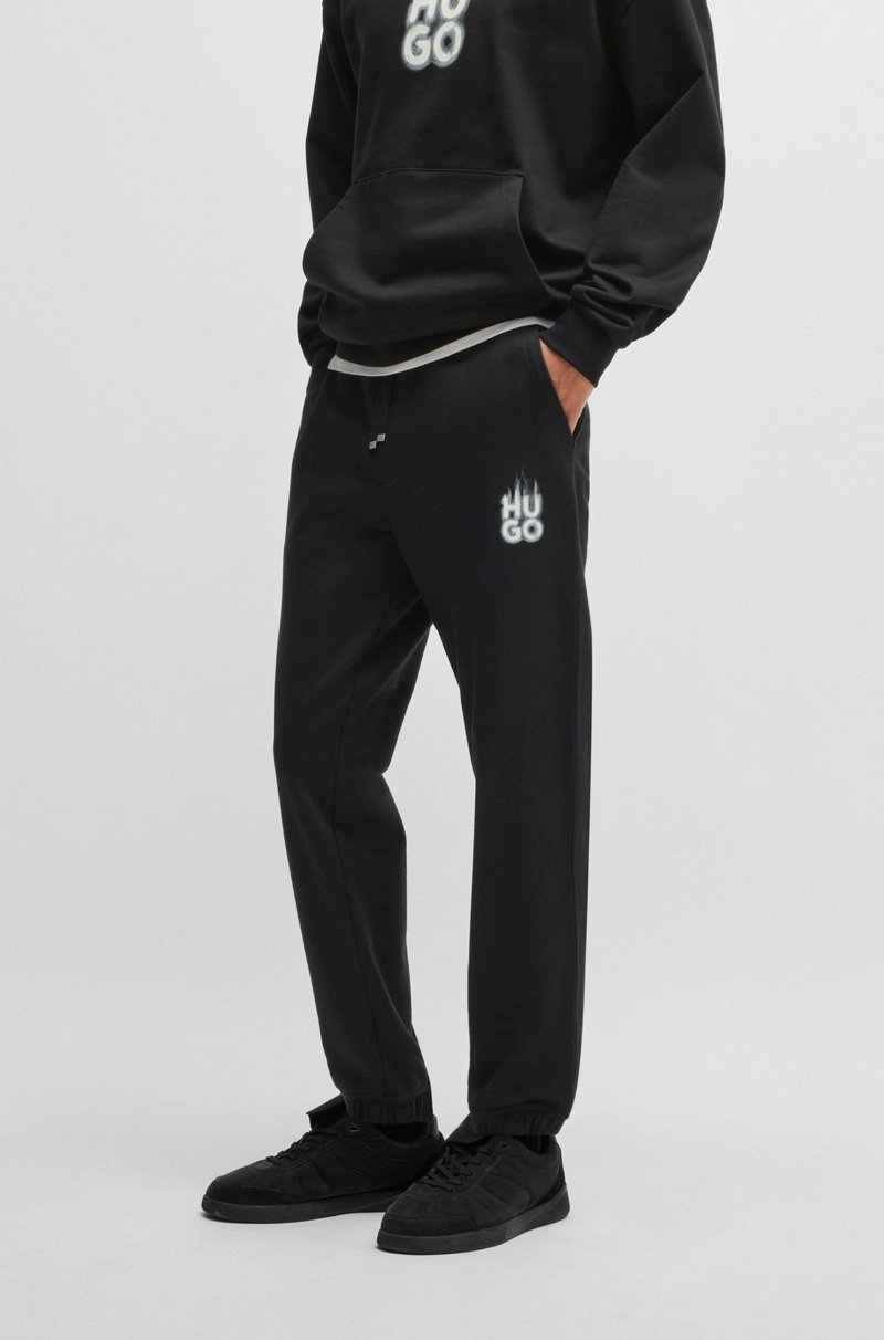 Hugo Boss Pantalones de chándal en felpa de algodón con logo ahumado Ofertas