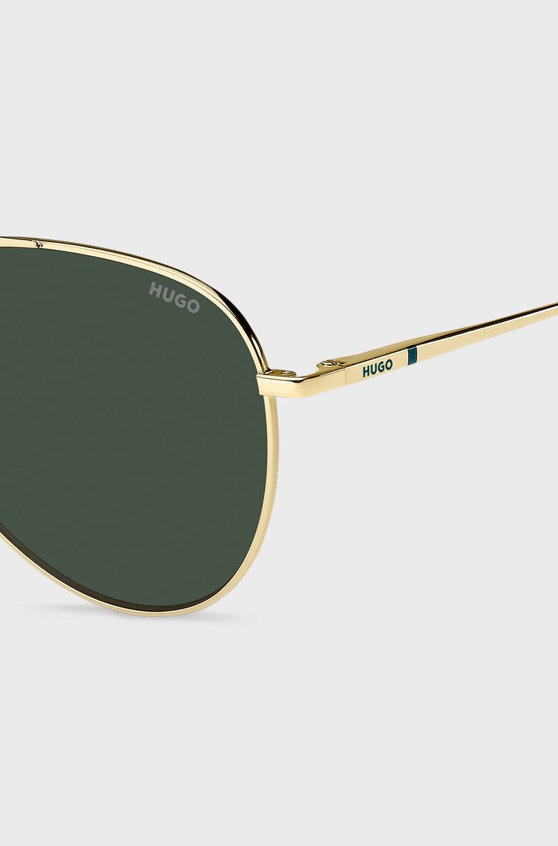 Hugo Boss Gafas de sol de doble puente con montura metálica en tono dorado Devoluciones gratuitas