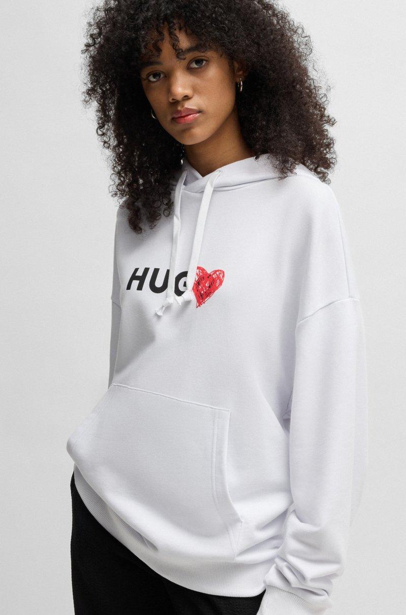 Hugo Boss Prenda con capucha en felpa de algodón con eslogan y gráficos de corazones COMPRAR AHORA