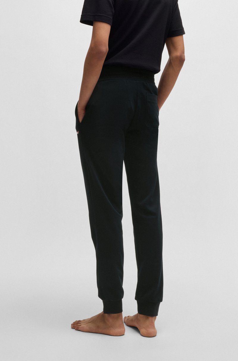 Hugo Boss Pantalones de chándal en mezcla de algodón con logo de corazón Grandes descuentos