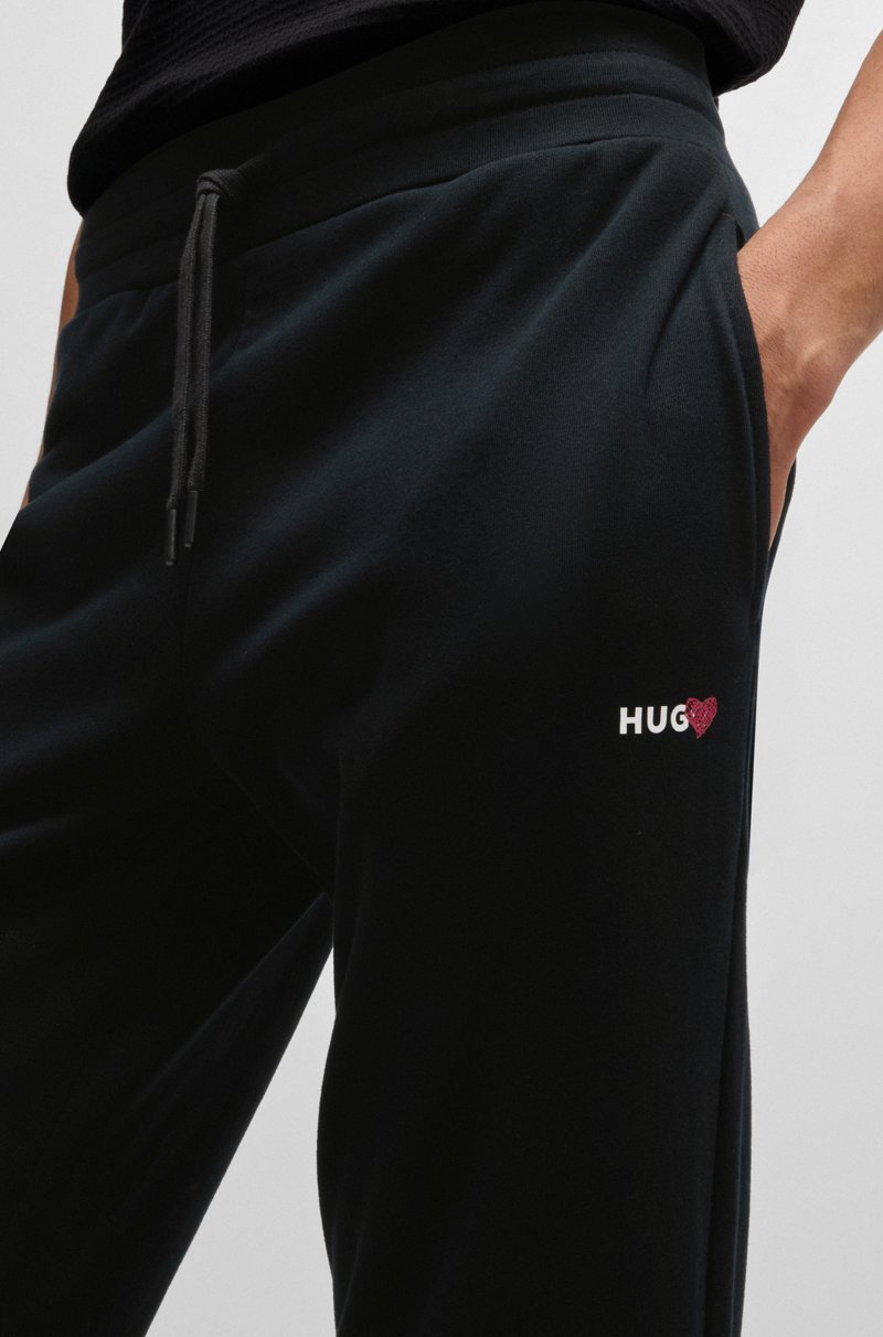 Hugo Boss Pantalones de chándal en mezcla de algodón con logo de corazón Grandes descuentos