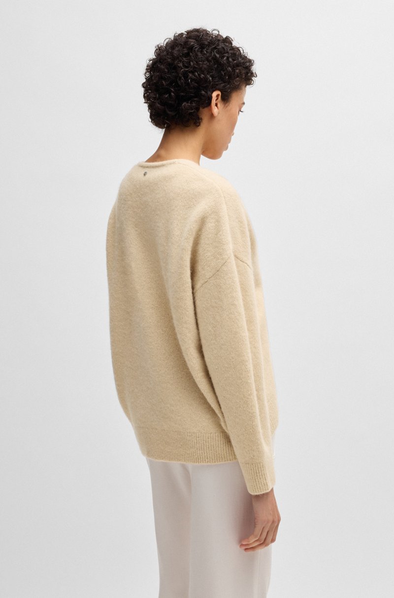 Hugo Boss Jersey relaxed fit de mezcla de lana con cuello en pico Los más vendidos