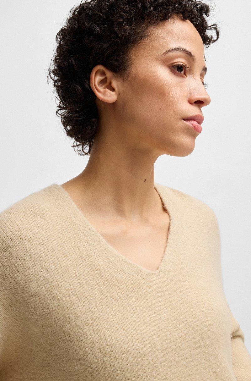 Hugo Boss Jersey relaxed fit de mezcla de lana con cuello en pico Los más vendidos