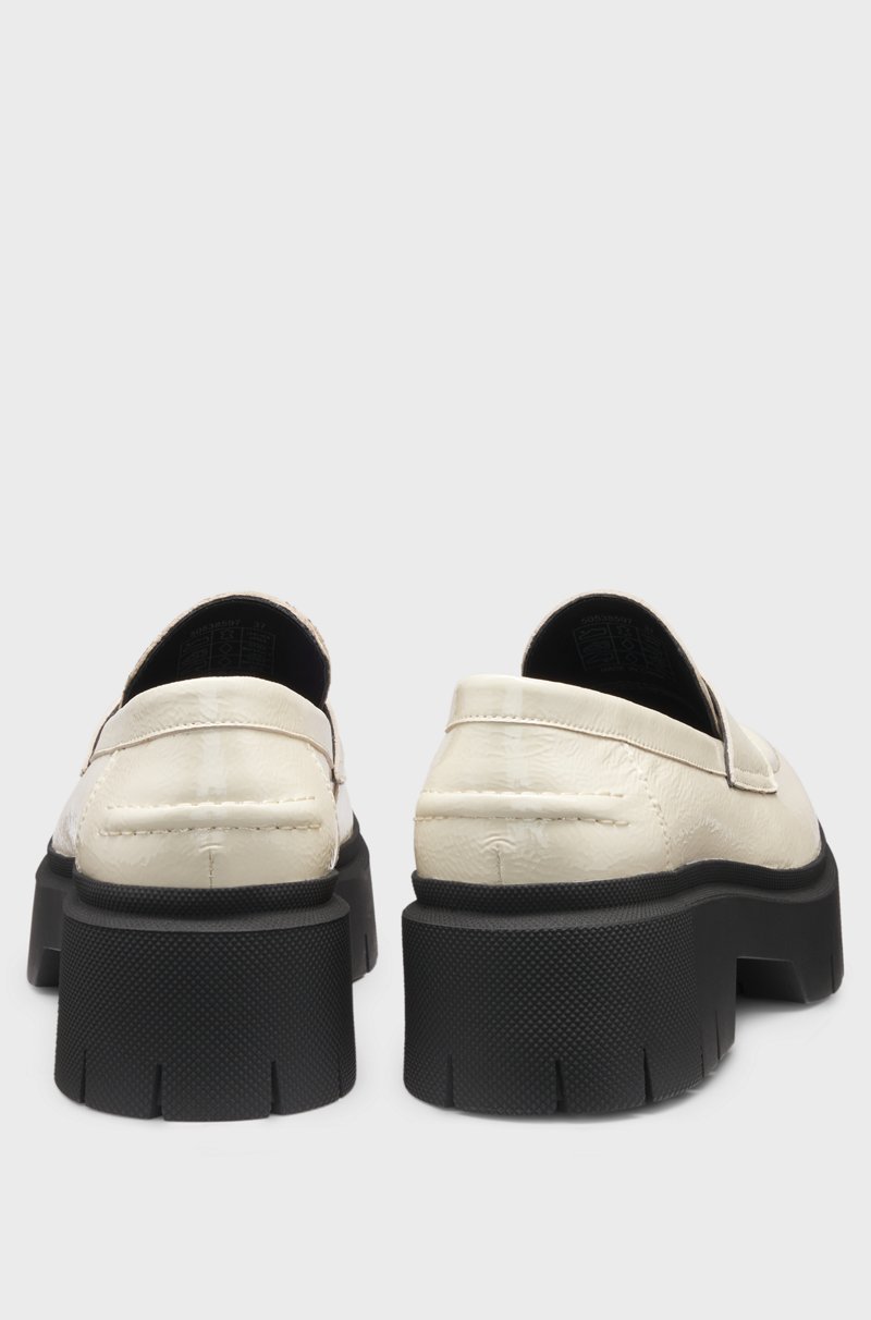 Hugo Boss Mocasines de piel con suela gruesa y ribete con logo apilado Ventas relámpago