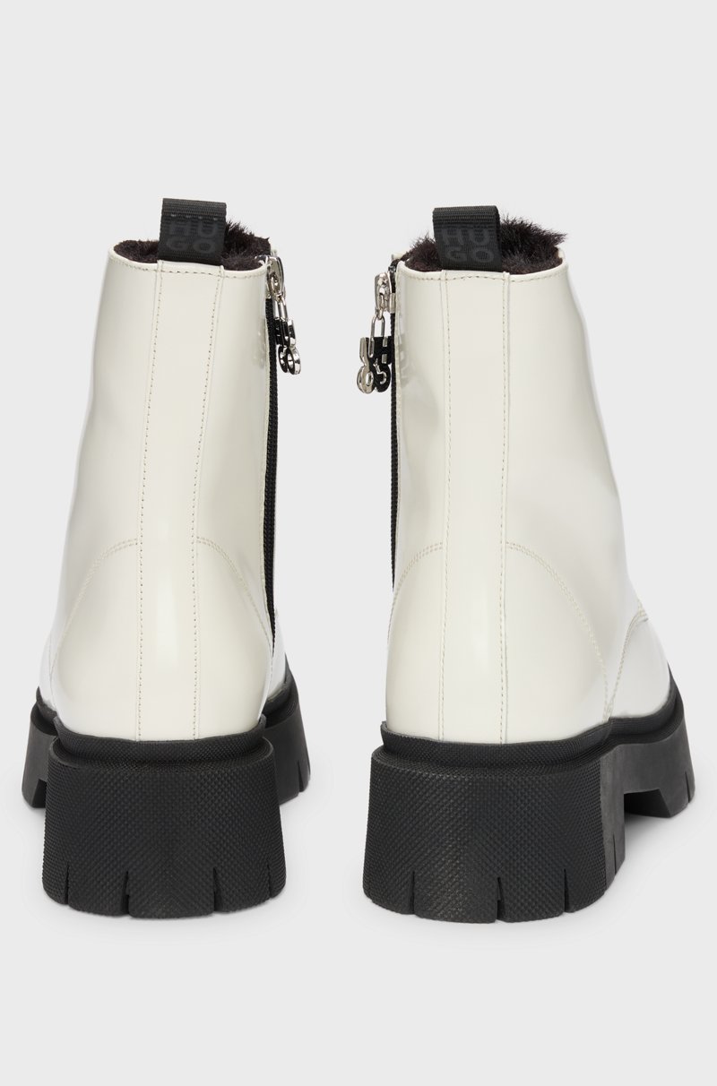 Hugo Boss Botas de piel sintética con logo en el cursor de la cremallera Envío gratis