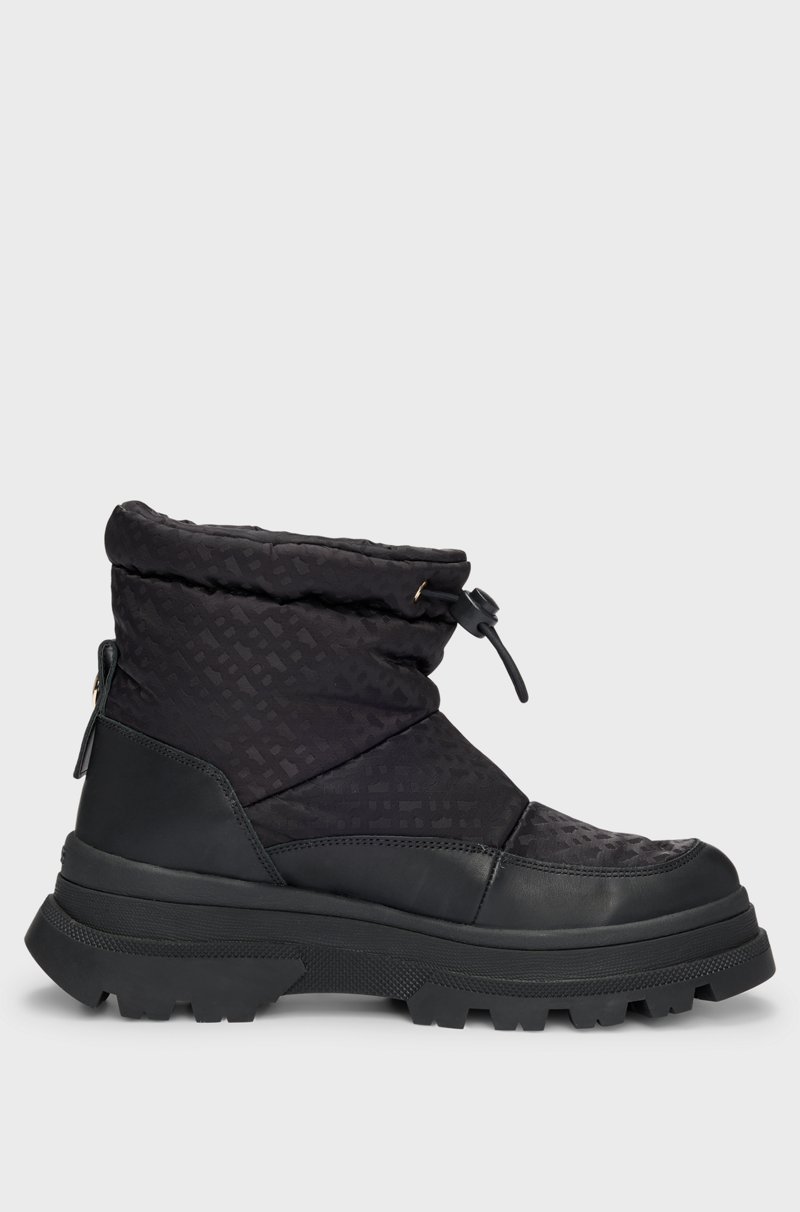 Hugo Boss Botas slim fit con motivo de monogramas y apliques de piel Último día