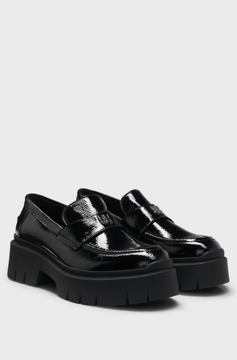 Hugo Boss Mocasines de piel con suela gruesa y ribete con logo apilado