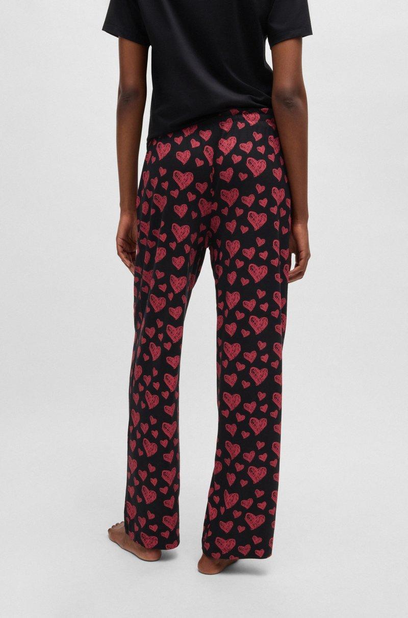Hugo Boss Pantalones de pijama de punto de mezcla de modal con estampado integral de corazones Rebajas baratas