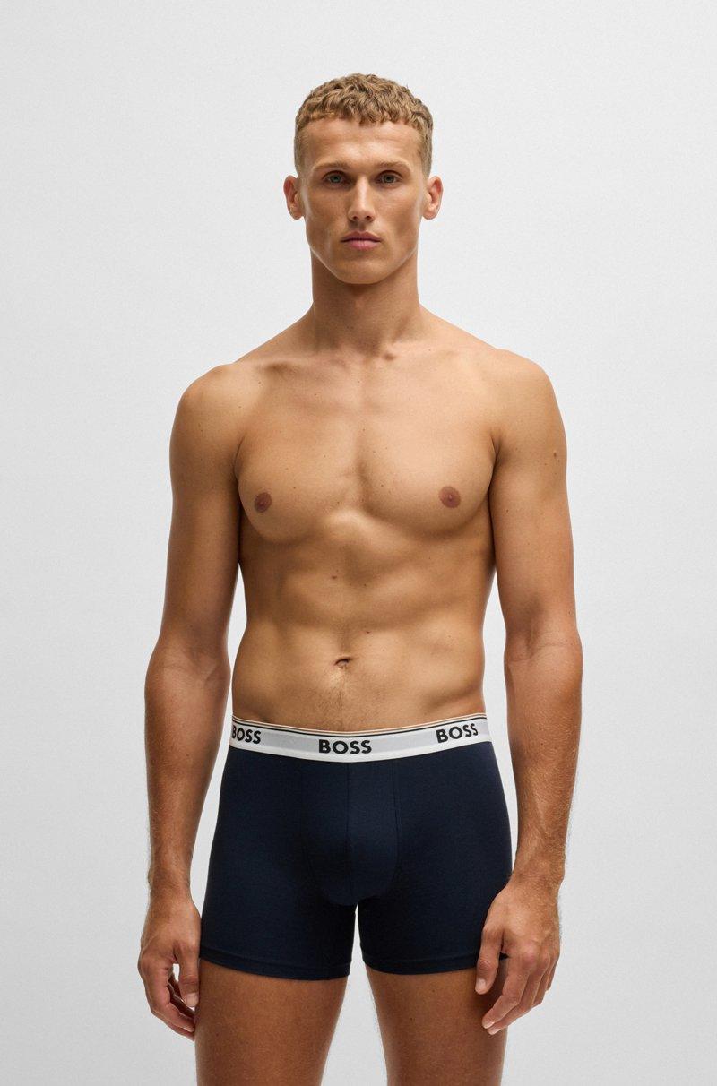 Hugo Boss Paquete de tres calzoncillos bóxer en algodón elástico con logos COMPRAR AHORA