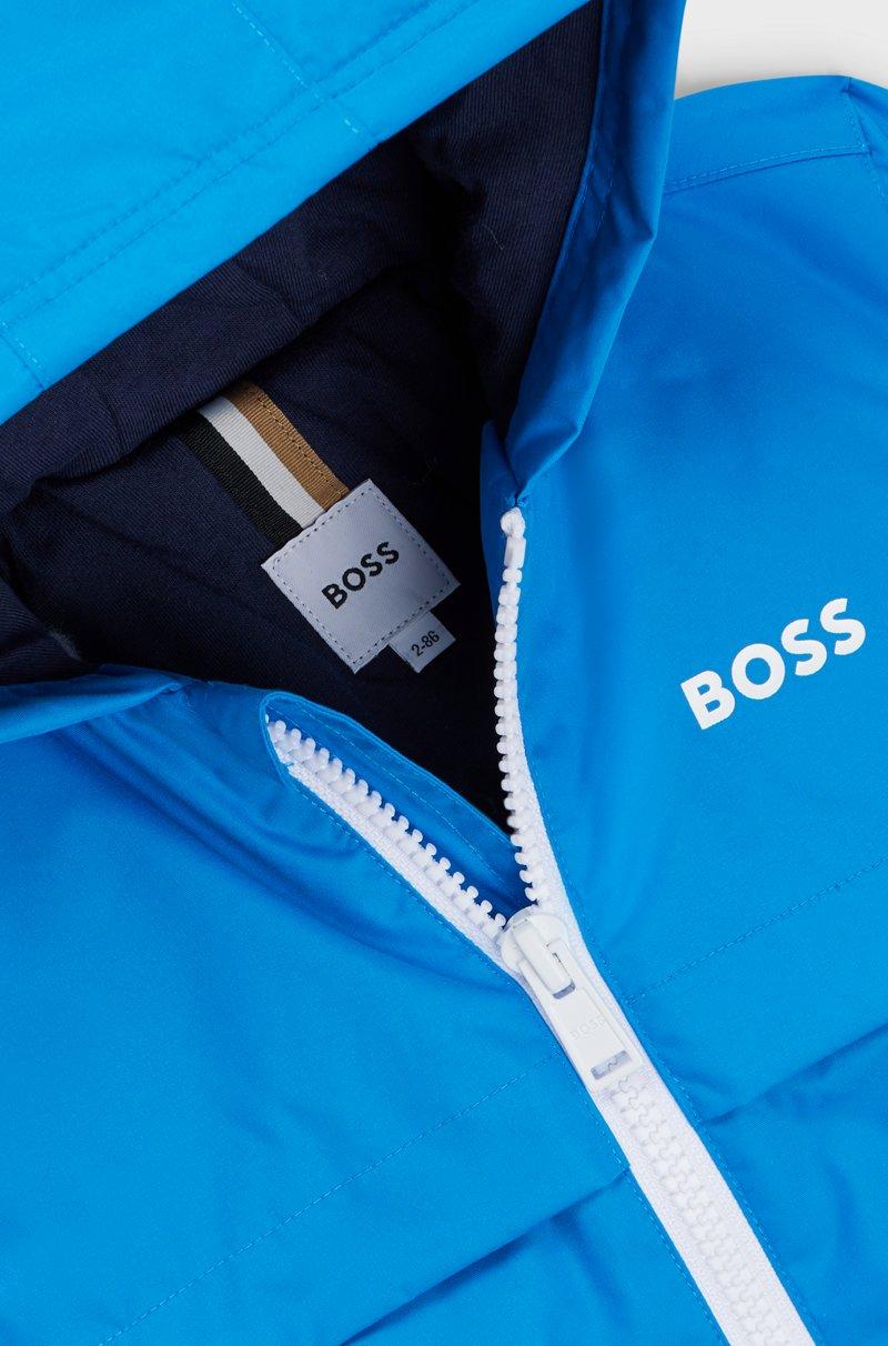 Hugo Boss Cazadora cortavientos para niños con bloques de color y estampado de monogramas que aparece con el agua Limitado a 3 días