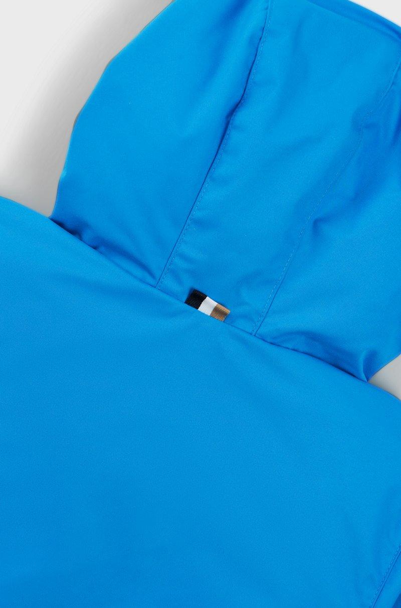 Hugo Boss Cazadora cortavientos para niños con bloques de color y estampado de monogramas que aparece con el agua Limitado a 3 días