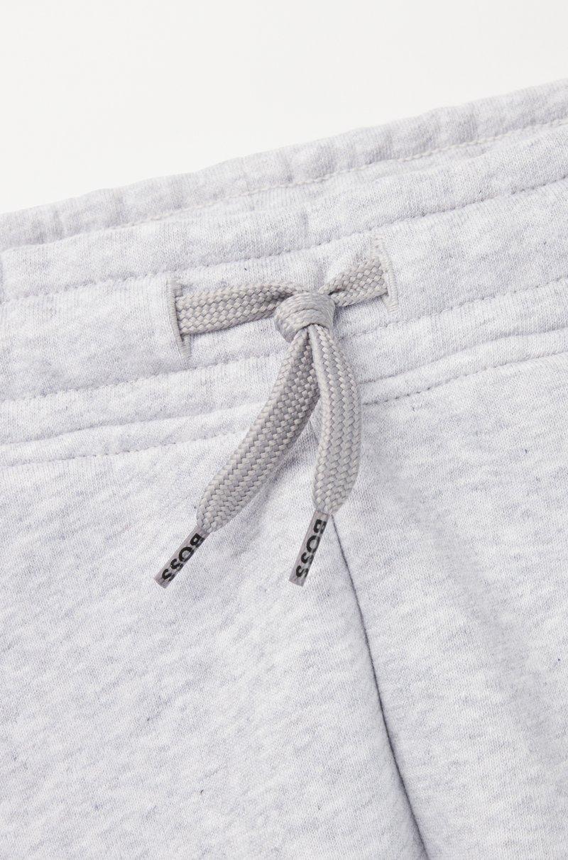 Hugo Boss Pantalones de chándal para niños en algodón con logo vertical estampado Devoluciones gratuitas