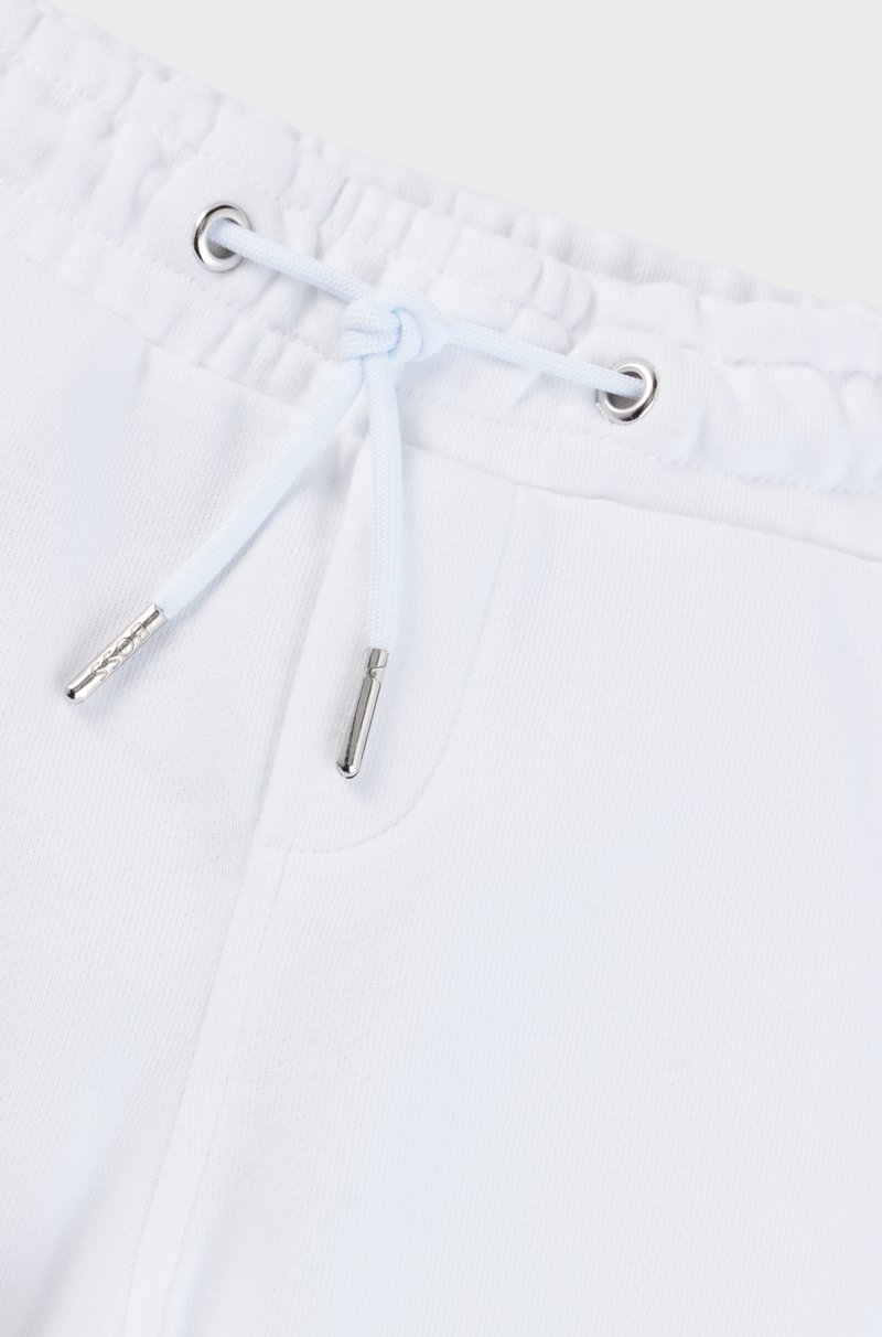 Hugo Boss Pantalones de chándal para niños con puños en los bajos y logo estampado Rebajas top