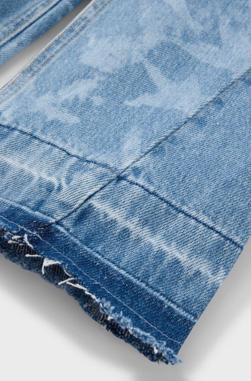 Hugo Boss Vaqueros relaxed fit para niños en denim de algodón con estampado de estrellas COMPRAR AHORA
