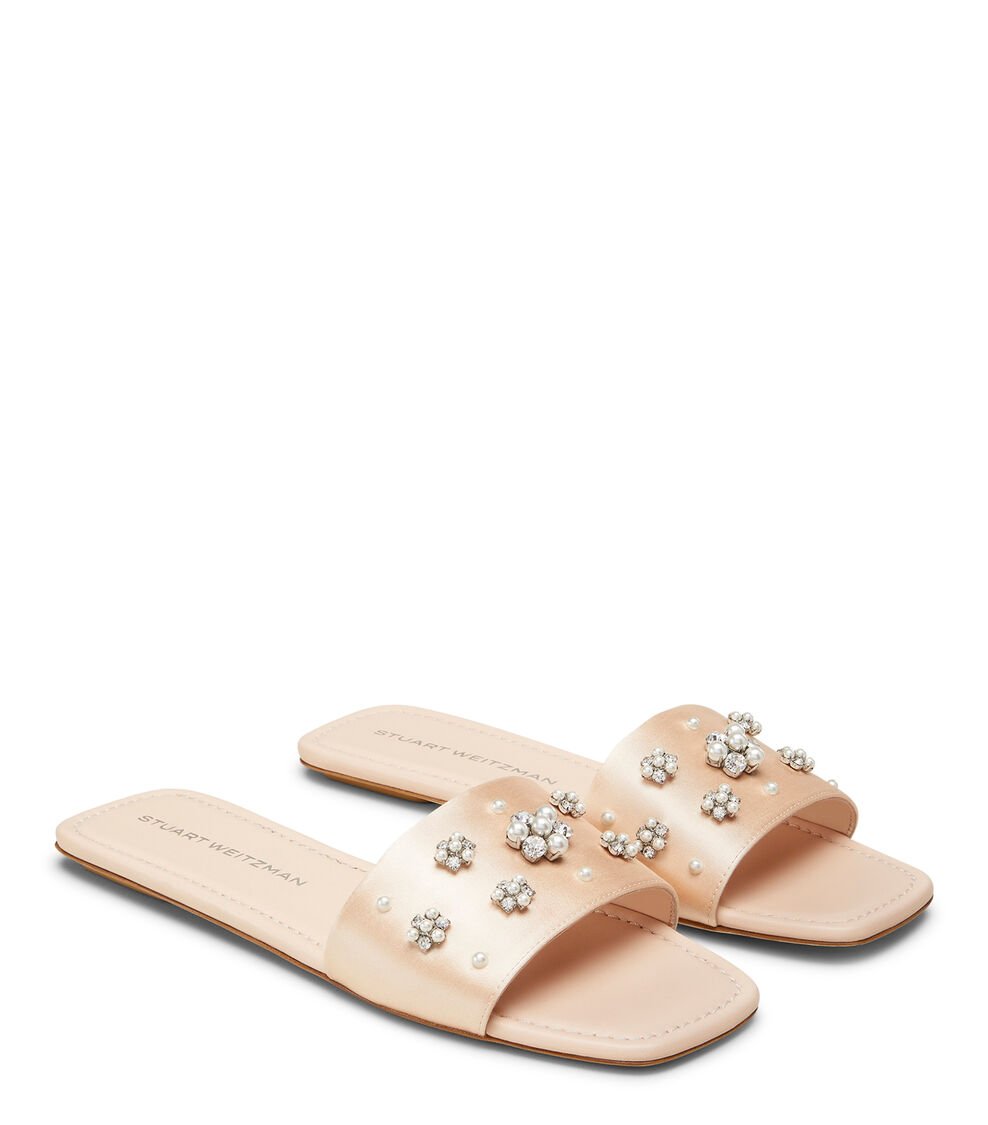 Stuart Weitzman POPPY FLAT SLIDE en BLUSH/CLARO/NATURAL de Mujer | Stuart Weitzman® Envío internacional gratuito