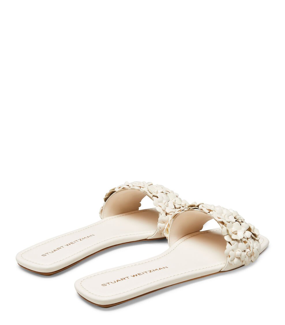 Stuart Weitzman MEADOW FLAT SLIDE en SEASHELL de Mujer | Stuart Weitzman® Últimos 2 días