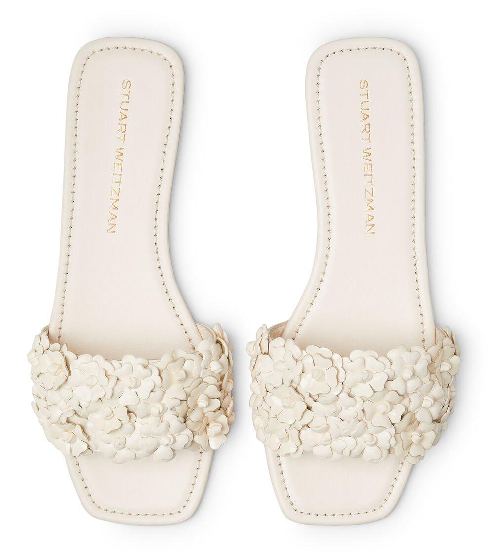 Stuart Weitzman MEADOW FLAT SLIDE en SEASHELL de Mujer | Stuart Weitzman® Últimos 2 días