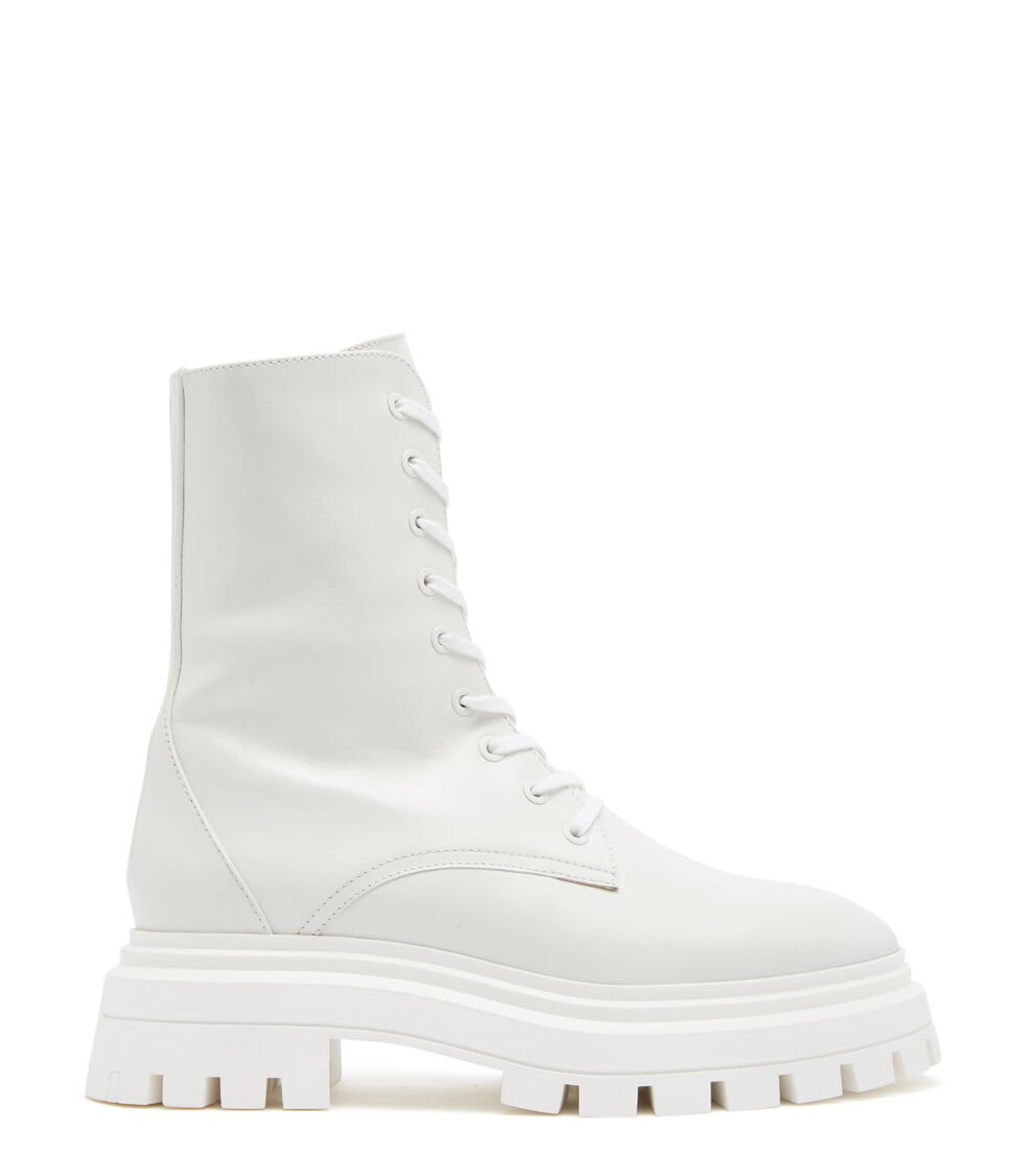 Stuart Weitzman BEDFORD SLEEK LACE-UP BOOTIE en WHITE de Mujer | Stuart Weitzman® Tienda