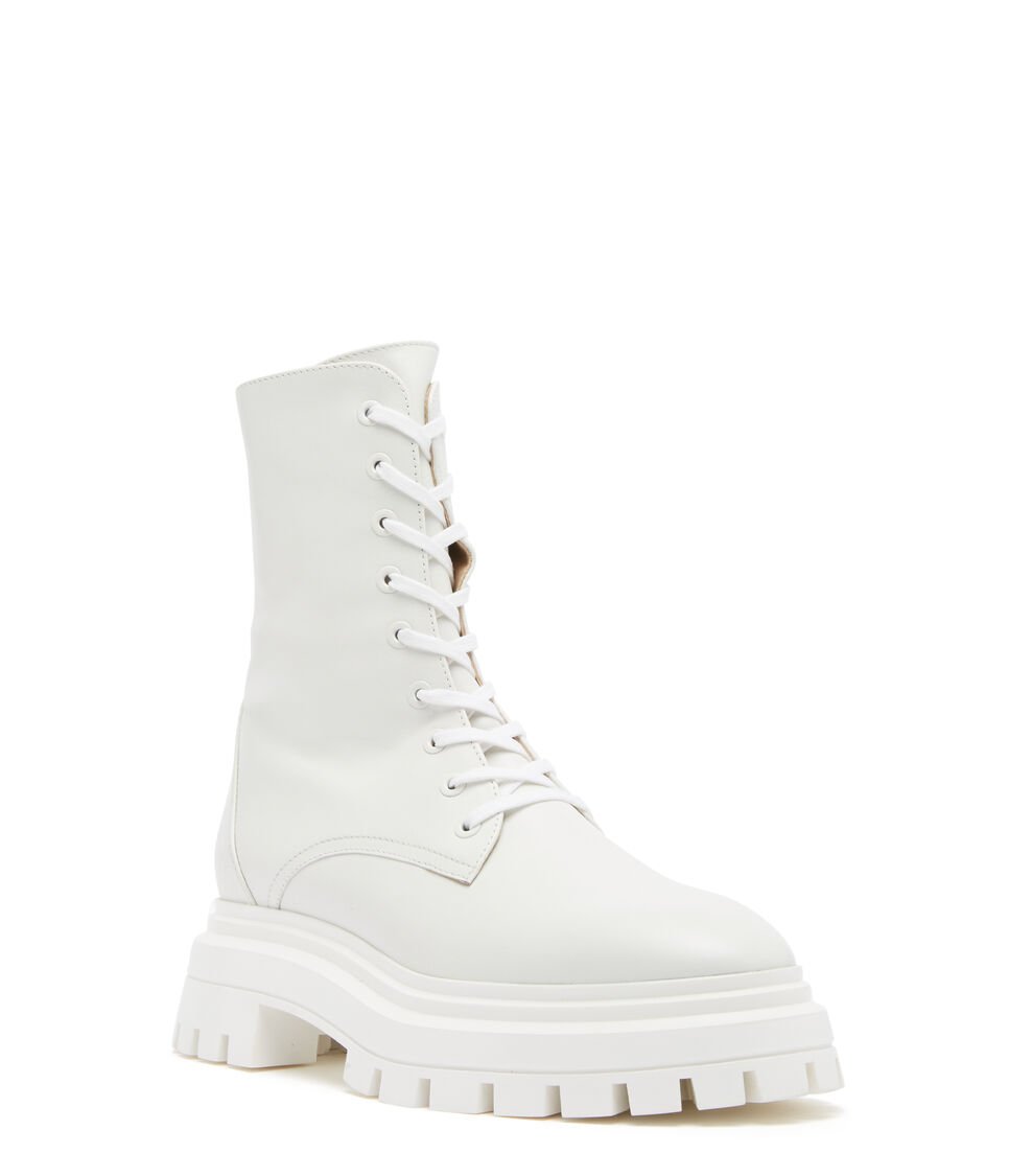 Stuart Weitzman BEDFORD SLEEK LACE-UP BOOTIE en WHITE de Mujer | Stuart Weitzman® Tienda